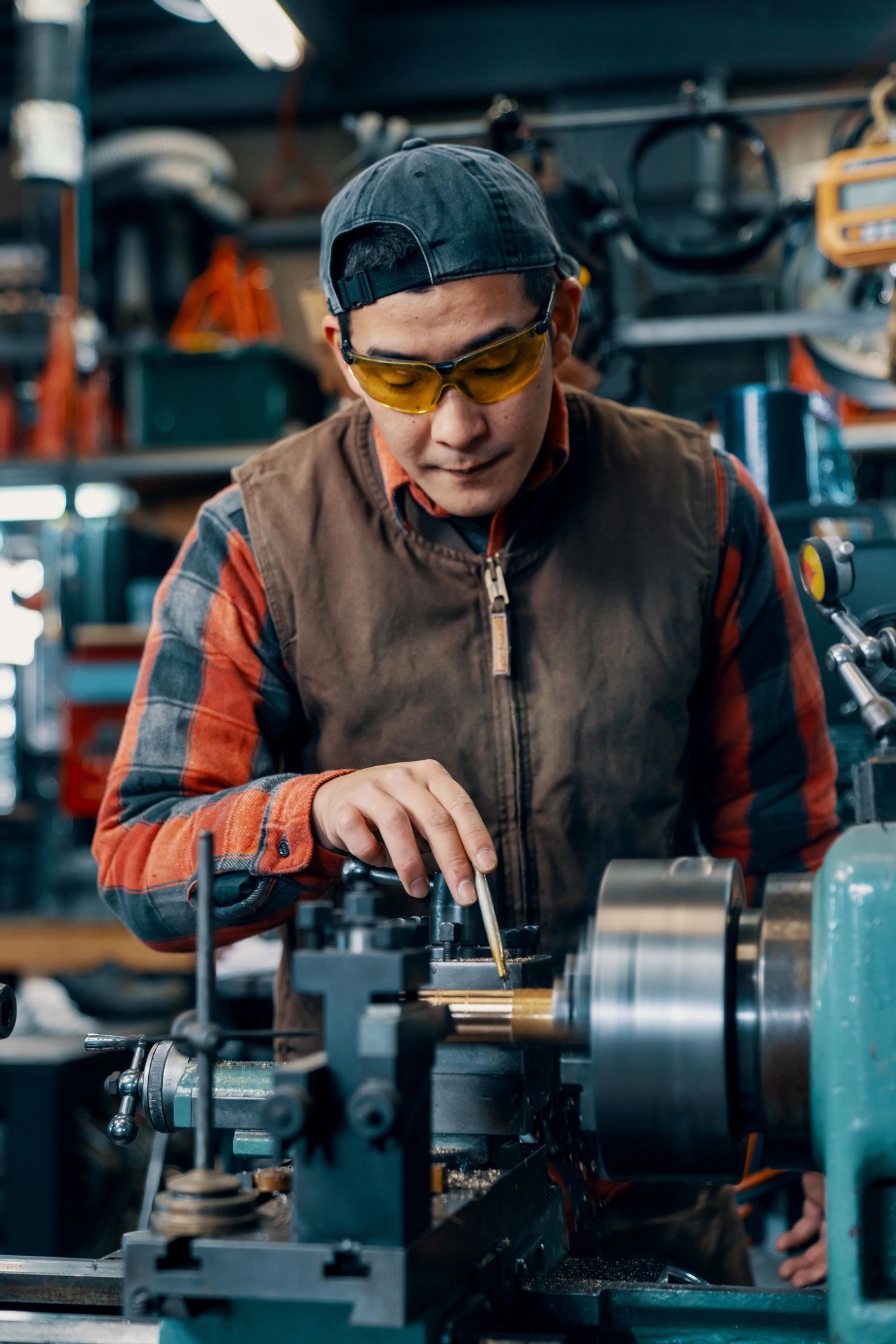 Industrial professional working in a fabrication workshop